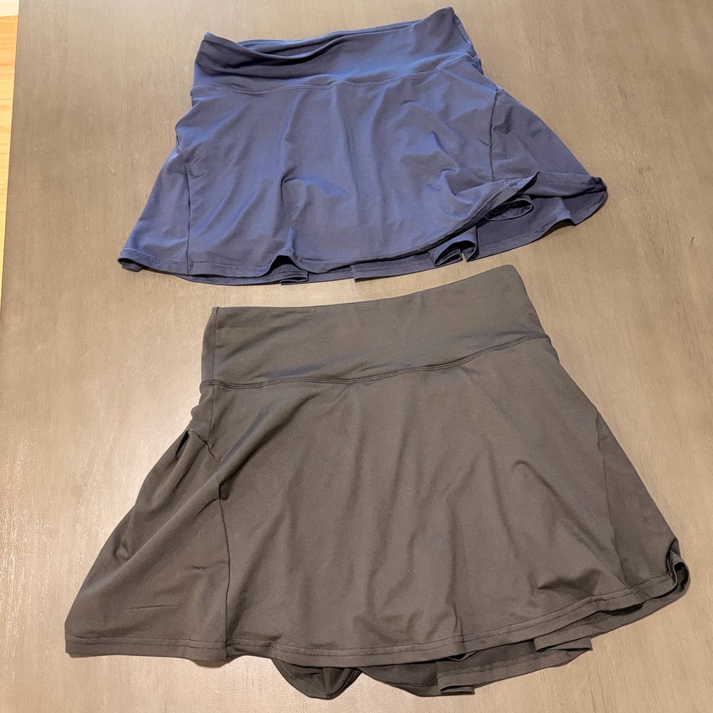 Two (2) Pleated, High Waisted Tennis Skirts with pockets and built-in shorts
